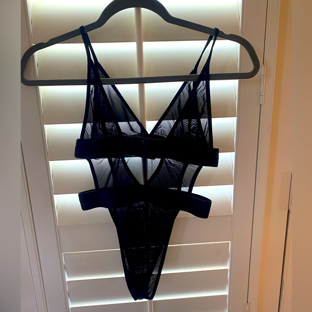 Black body suit.